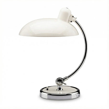 White table lamp with curved arm on a white background