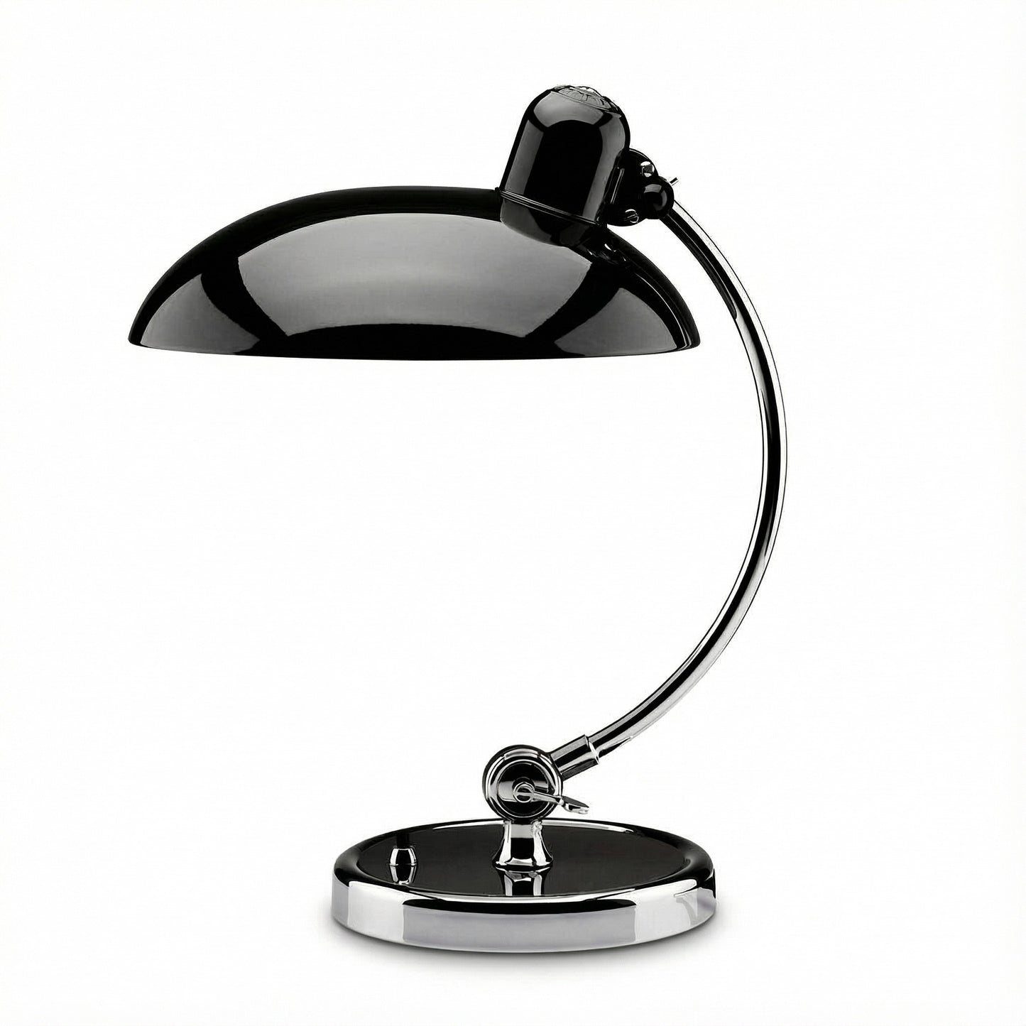 Black and chrome desk lamp on a white background