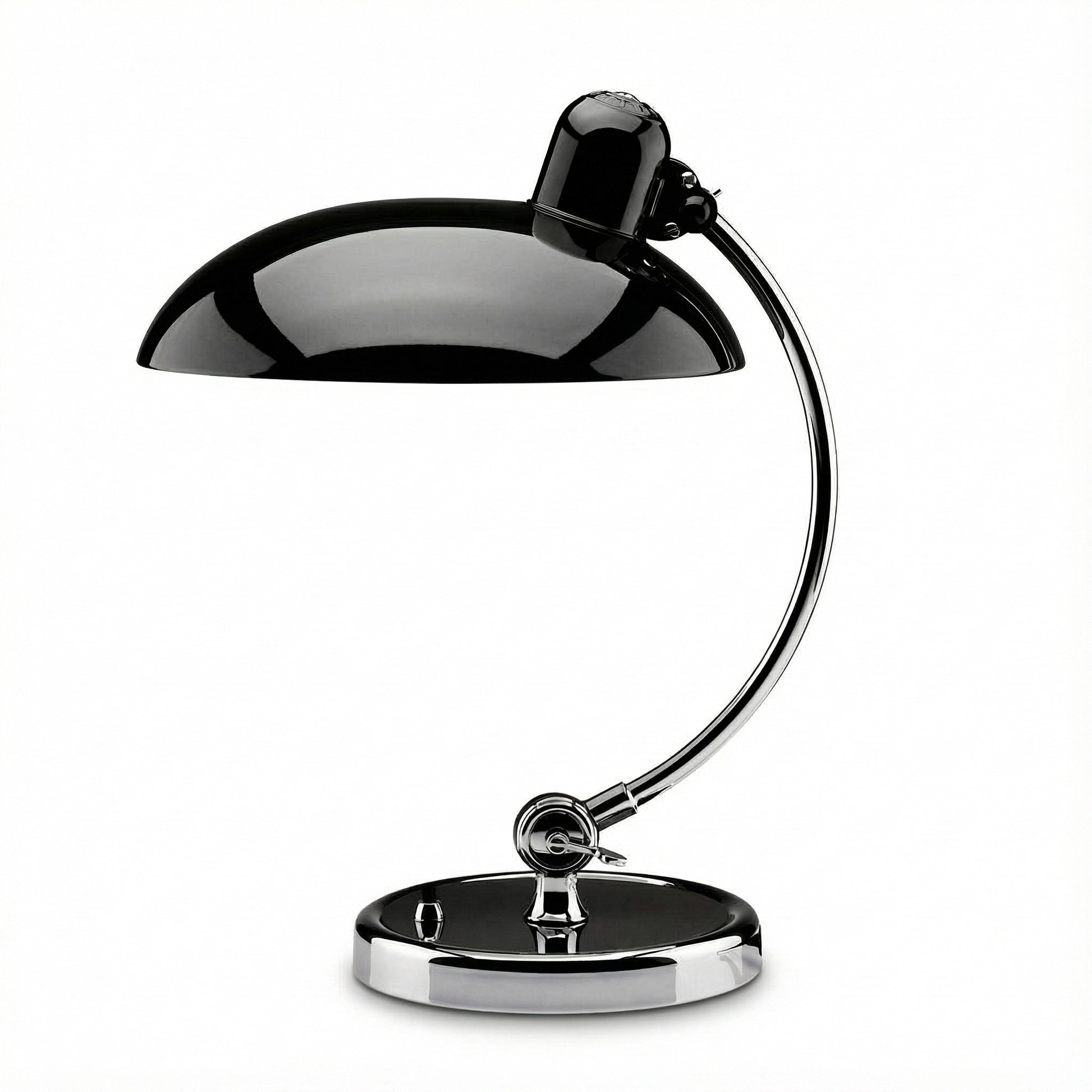 Black and chrome desk lamp on a white background