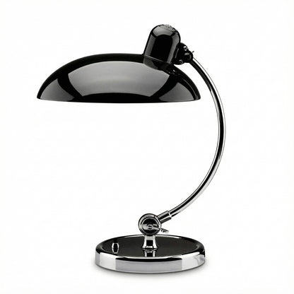 Black and chrome desk lamp on a white background