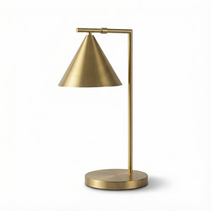 Gold table lamp with adjustable arm on a white background