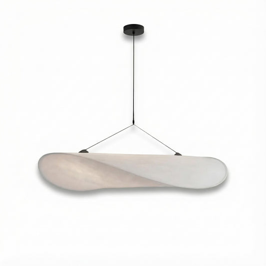 Modern pendant light with a white shade on a white background