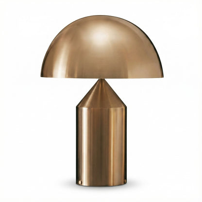 Bronze table lamp with a dome-shaped shade on a white background