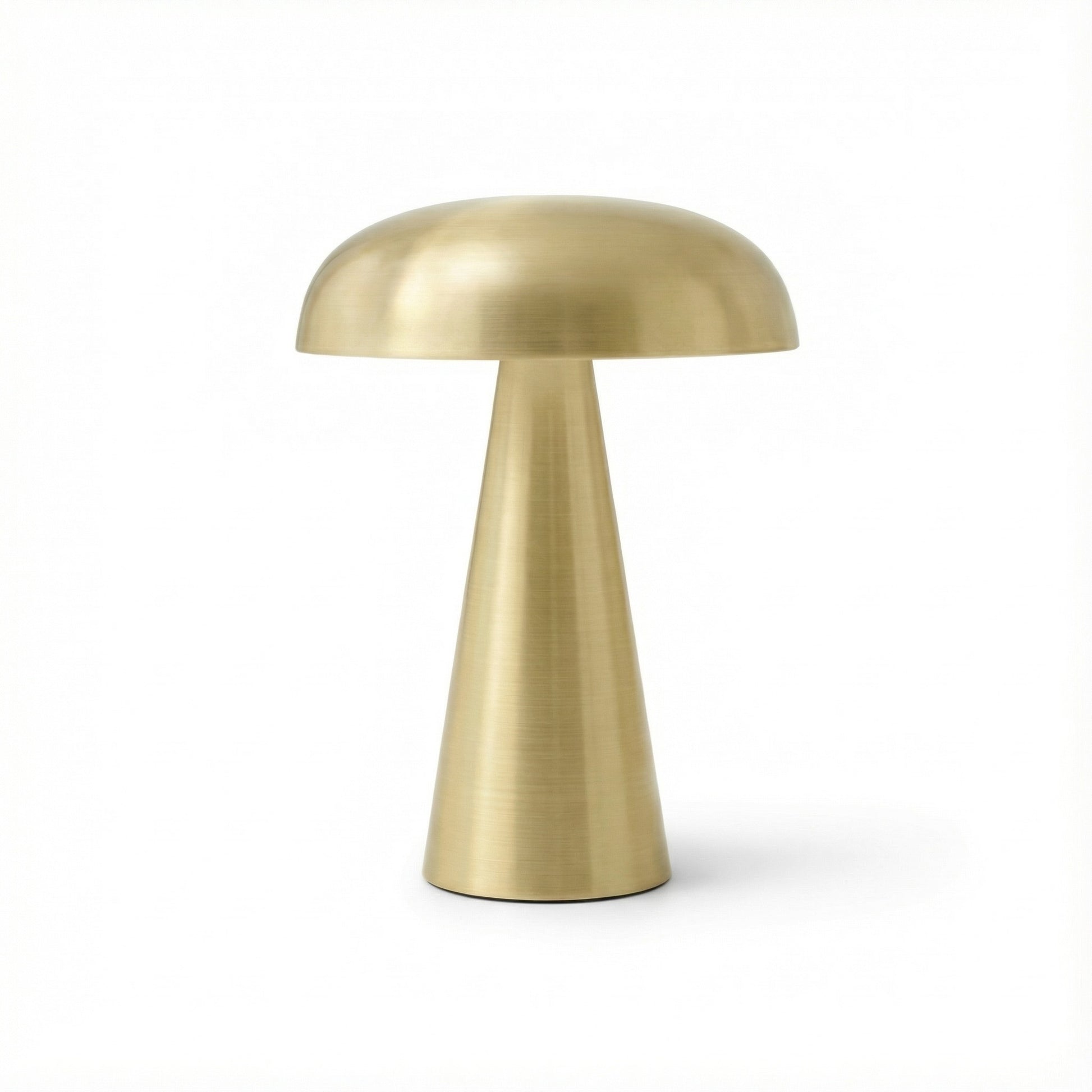 Gold table lamp on a white background
