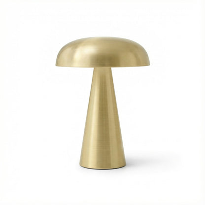 Gold table lamp on a white background