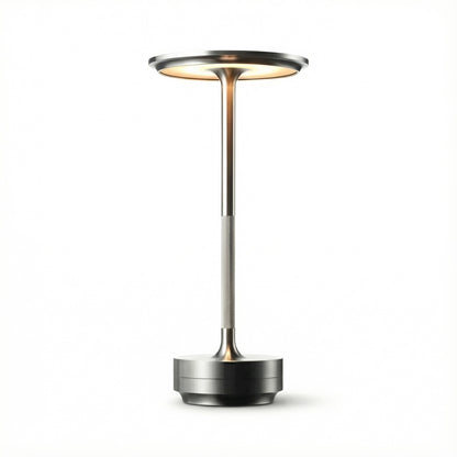 Modern outdoor lamp with a black base and metallic finish on a white background