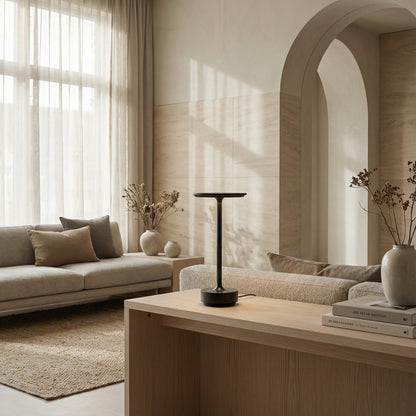Modern living room with beige sofa, wooden coffee table, and decorative elements.