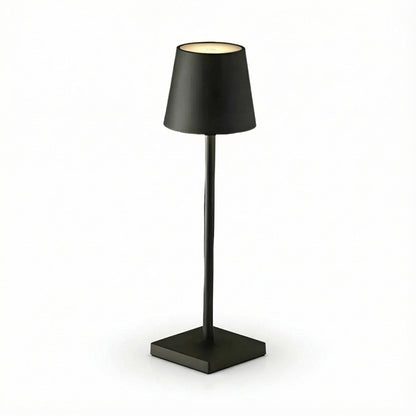 Black table lamp with a square base on a white background