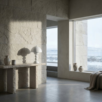 Modern interior with stone walls and a large window