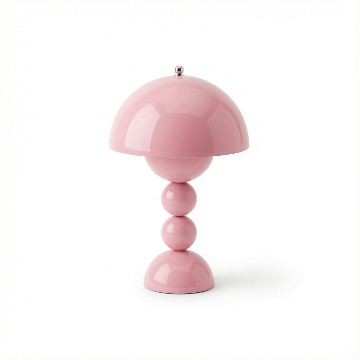 Pink table lamp with a white background