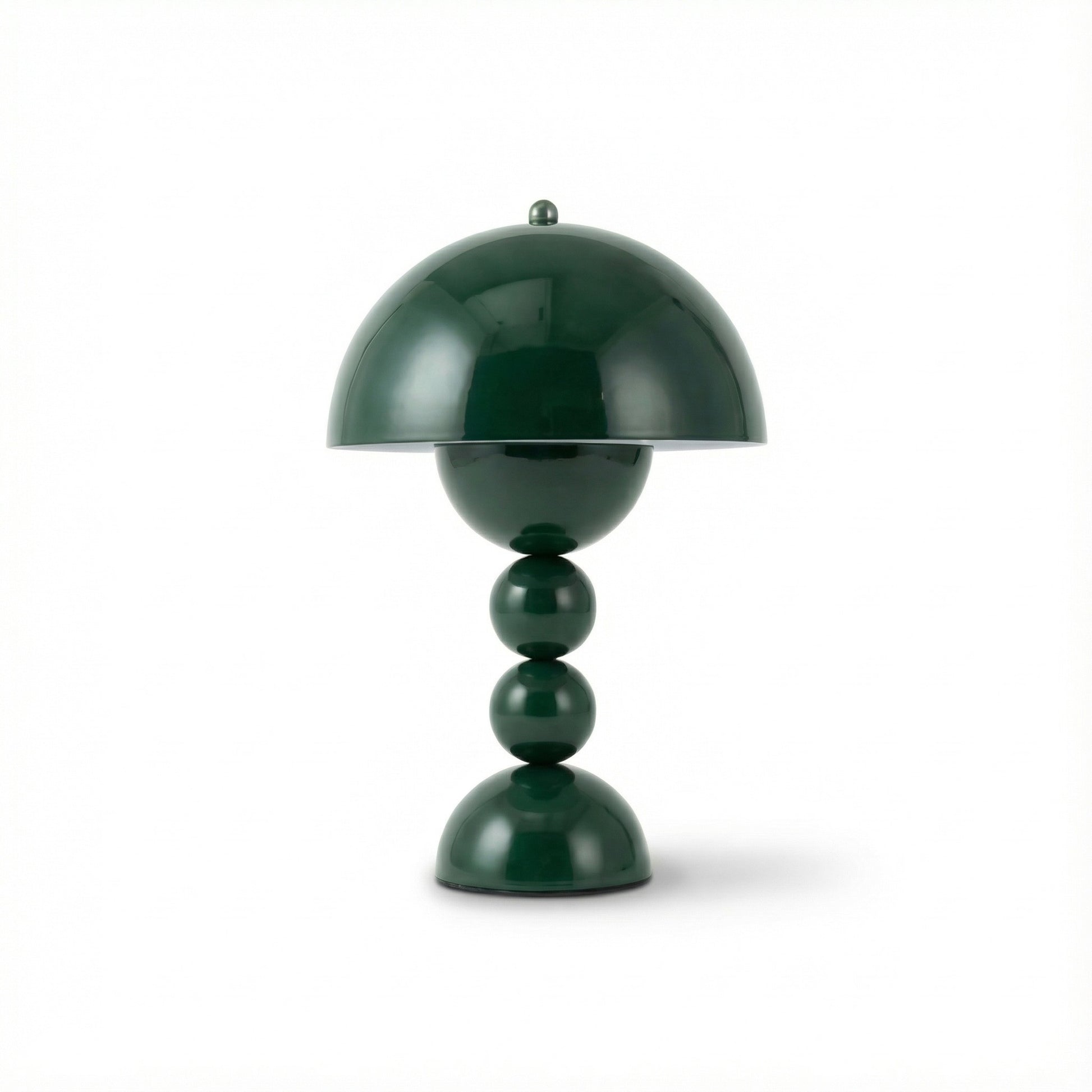 Green table lamp with a unique design on a white background