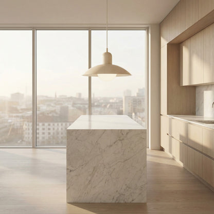 Modern kitchen with marble island and large windows