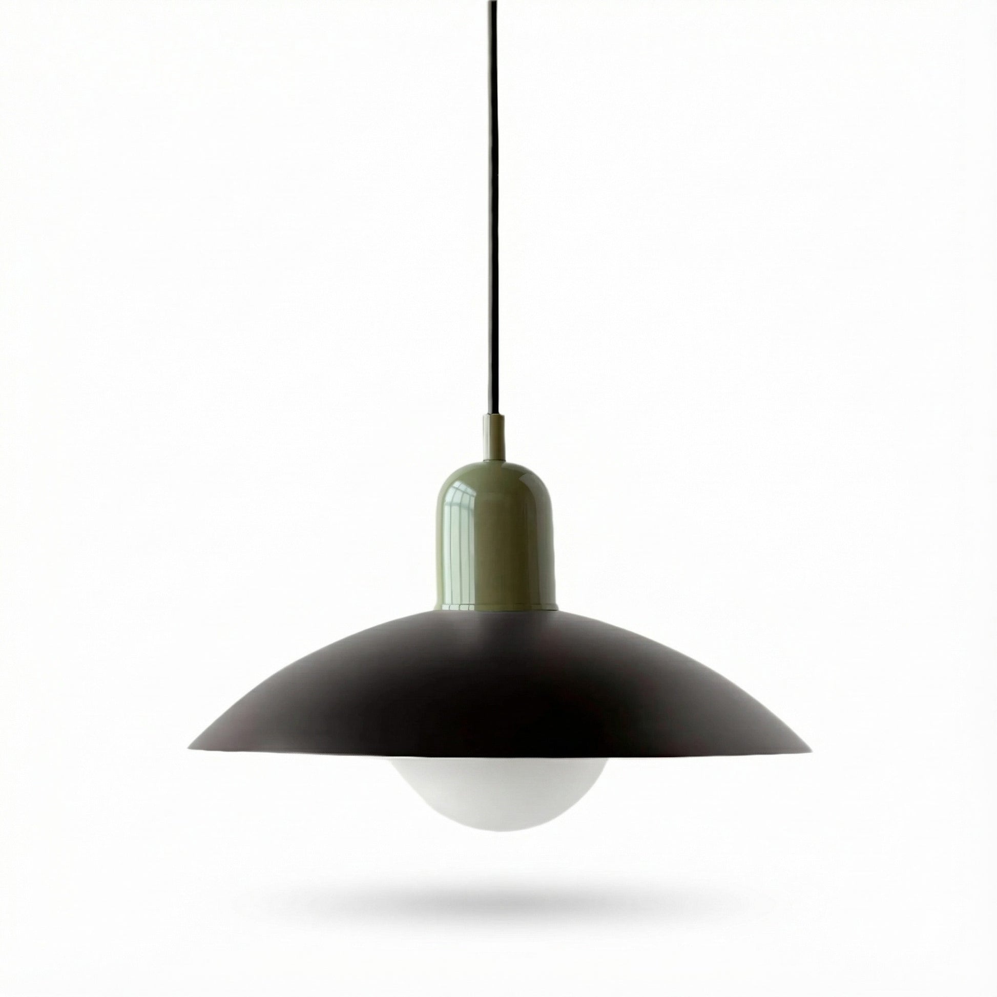 Pendant light with black shade and white bulb on a white background