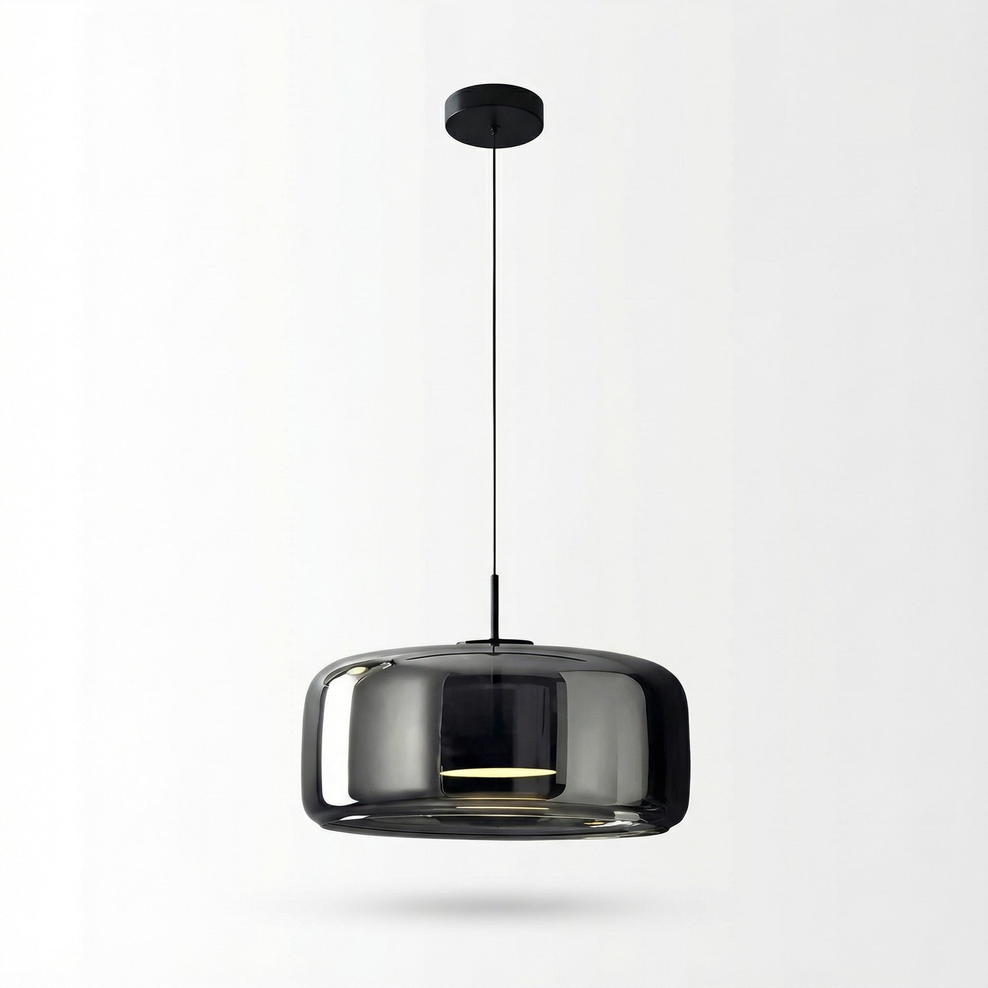 Modern pendant light with smoked glass shade on a white background