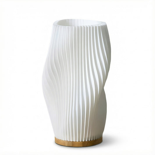 White ribbed vase with a wooden base on a white background